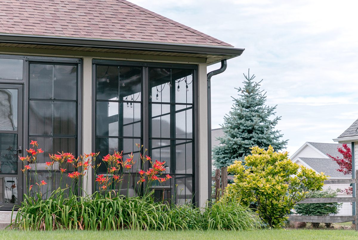 Close-up detail of porch enclosure glass panel system and aluminum frame, South Jersey NJ