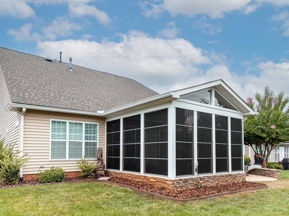 Screened porch with white wood frame and fiberglass screens in Stone Harbor, Cape May County NJ